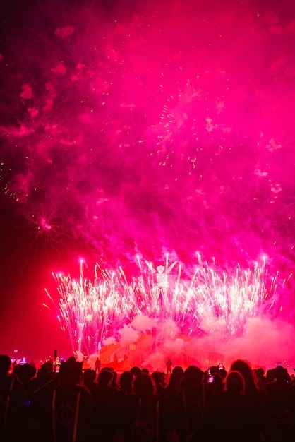 A vibrant image of a large crowd of fans at a Blackpink concert in the United States, emphasizing the group's popularity and Rosé's connection with her American audience. The image should convey excitement and anticipation for her solo debut.