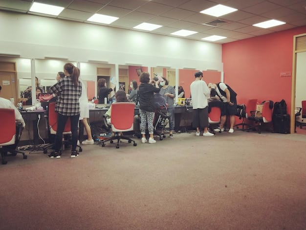 Interior view of SM Entertainment's New York office. Modern and open space, filled with employees working on computers, a recording studio, and a dance practice room.