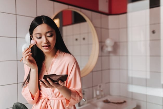 Shin Min Ah applying skincare products during her nighttime routine in a modern bathroom setting.