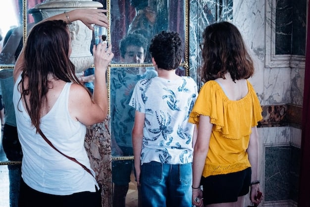 Yoo Ah In at an art gallery opening, surrounded by his own contemporary artworks.