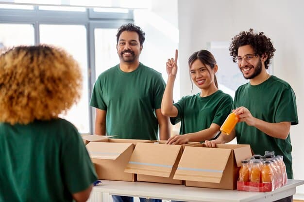 Volunteers wearing matching K-Pop themed t-shirts working together to pack food boxes at a local food bank, with smiles and a sense of community.