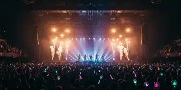 Dynamic K-Pop concert with enthusiastic fans and stage lighting for 2026 US tour