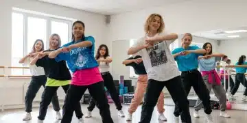 Diverse K-Pop dance cover group performing in a studio, full of energy and coordination.