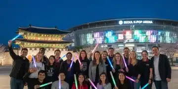 American fans with lightsticks awaiting a K-Pop concert in Seoul