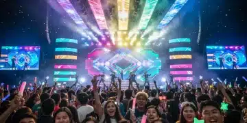 Diverse K-Pop fans at a vibrant concert with lightsticks, showing global engagement.