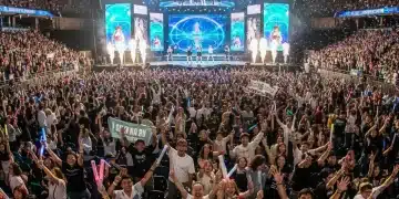 K-Pop Concerts US 2026: Your Ultimate Ticket Buying Guide Excited K-Pop fans with lightsticks at a US concert venue.
